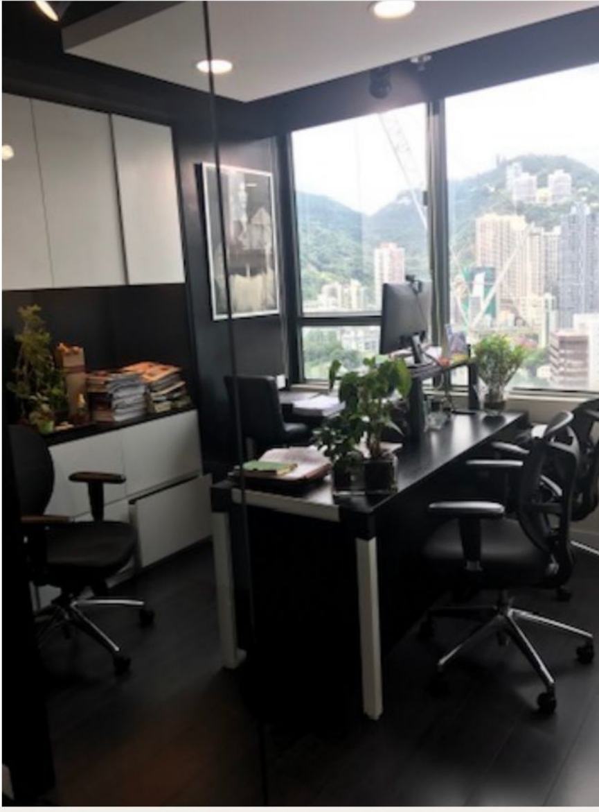 AMW's Hong Kong office, with city and hillside views